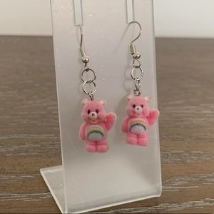 Handmade care bear cheer bear earrings.